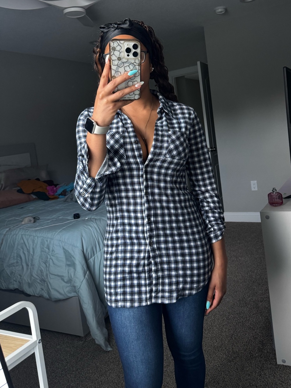 Impulsive black, blue and white Junior’s pocketed plaid button up tunic shirt